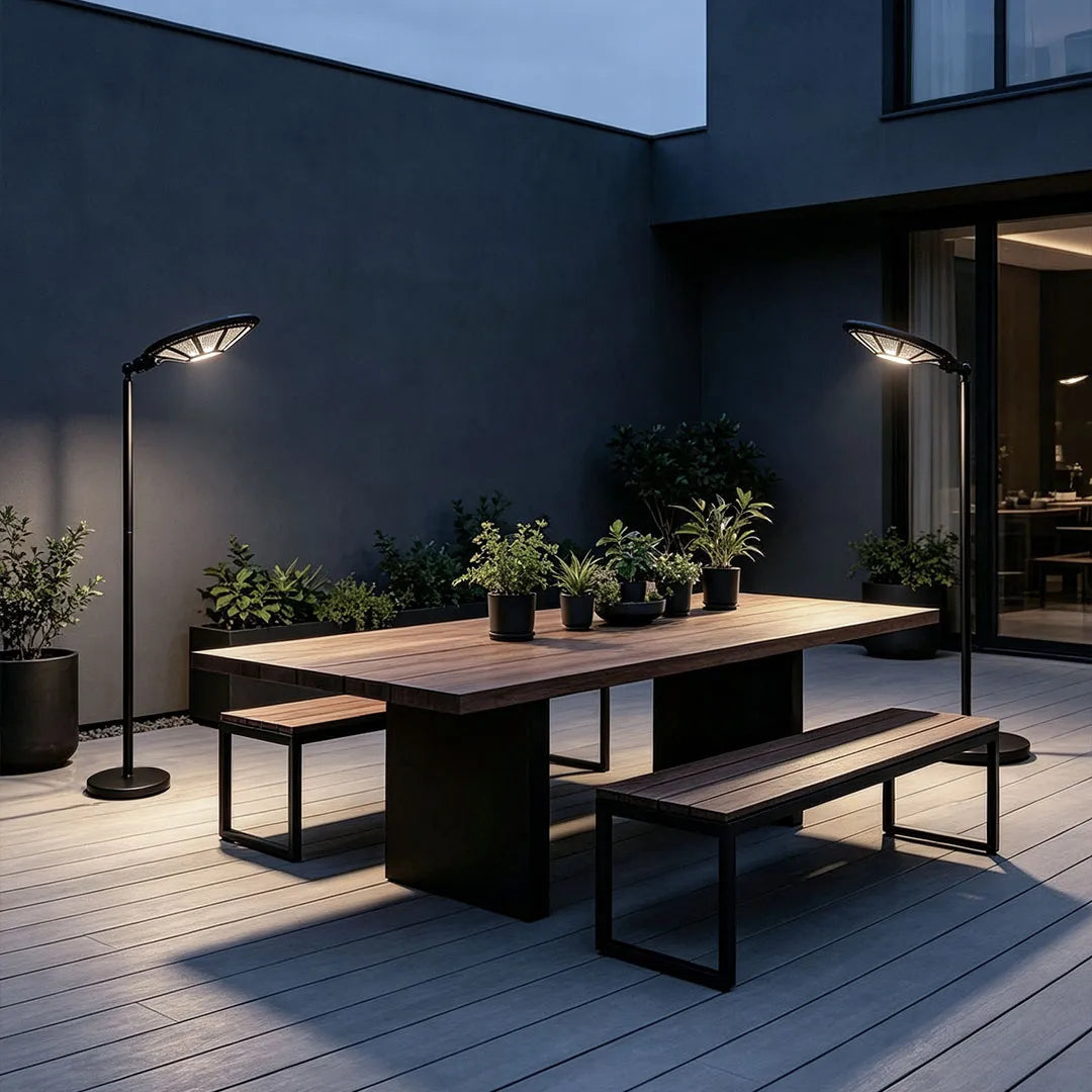Outdoor modern floor lamps providing focused lighting beside a contemporary patio dining table.