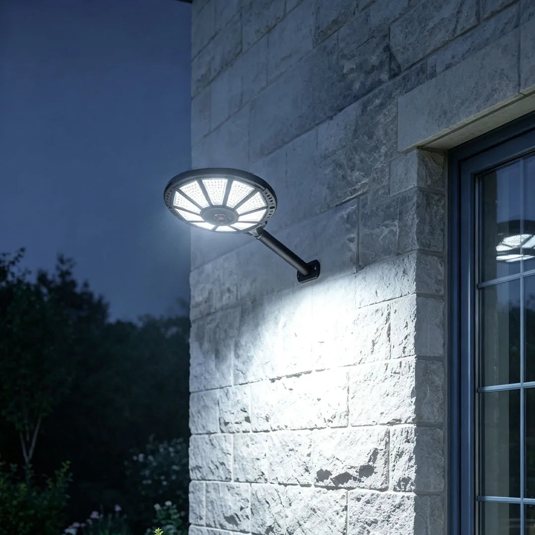 Outdoor modern floor lamps with an adjustable round LED head mounted beside an exterior wall.