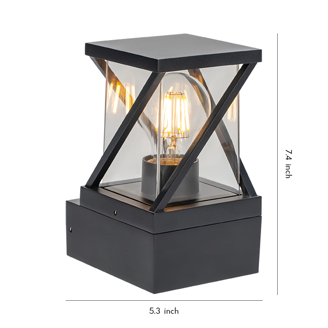 Classic black lantern-style outdoor modern wall sconce with transparent glass panels and warm filament bulb.