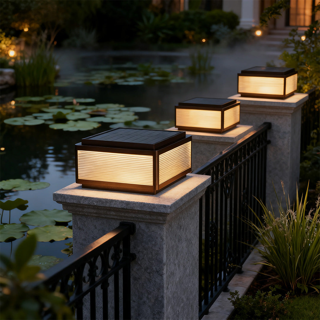 Outdoor patio pillar light placed near the waterfront, enhancing the outdoor ambiance with subtle lighting.