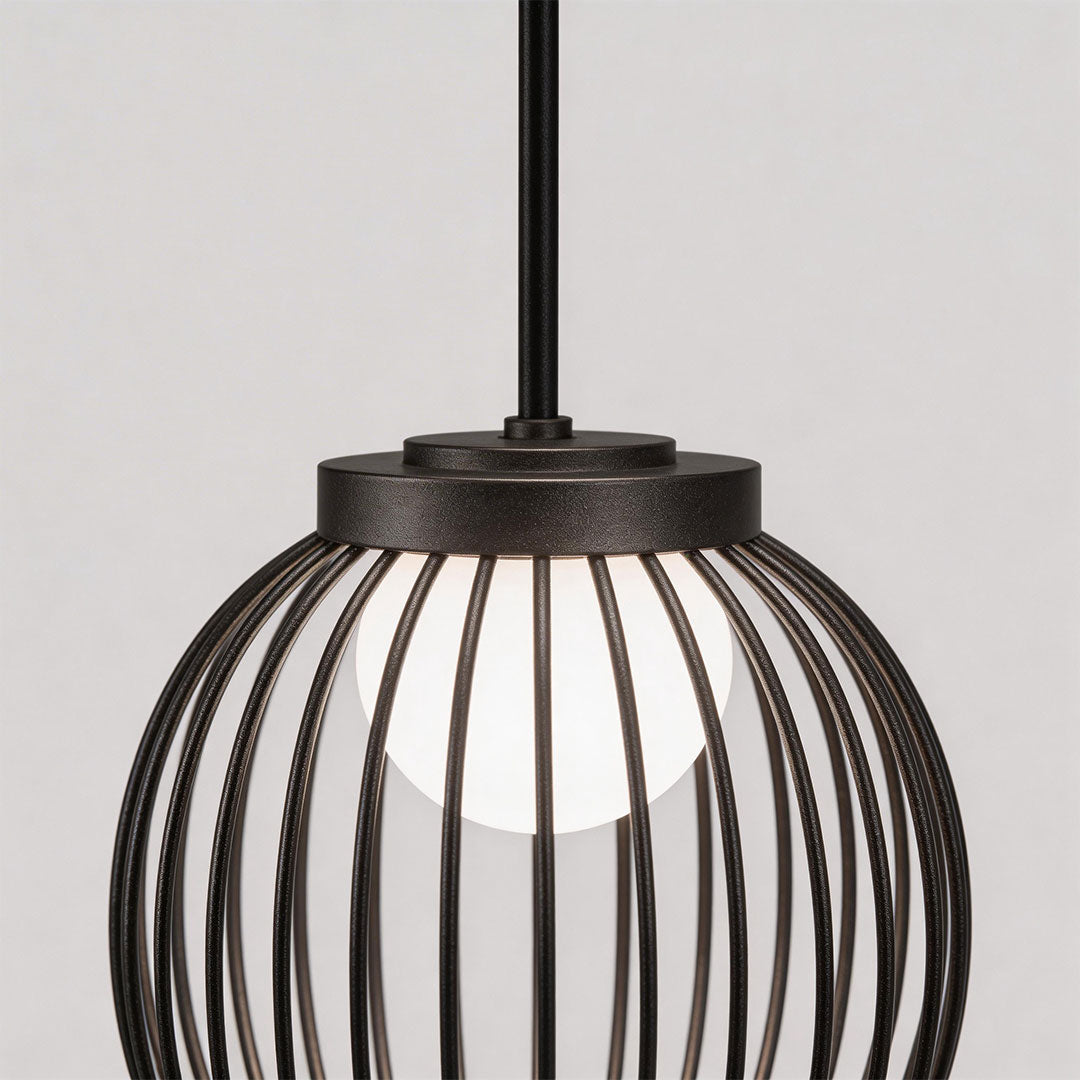 Close-up of outdoor pendant lighting modern showcasing its black metal cage design.