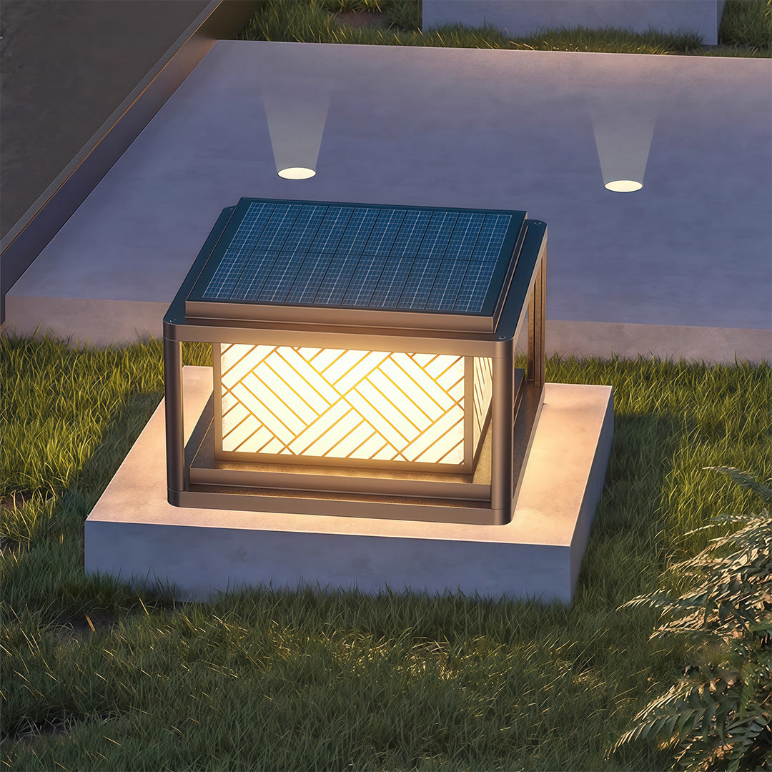 Outdoor pillar LED light installed on stone base creating soft garden illumination.