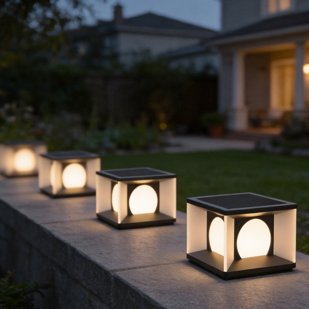 Outdoor pillar light enhancing a contemporary house entrance with elegant directional light.