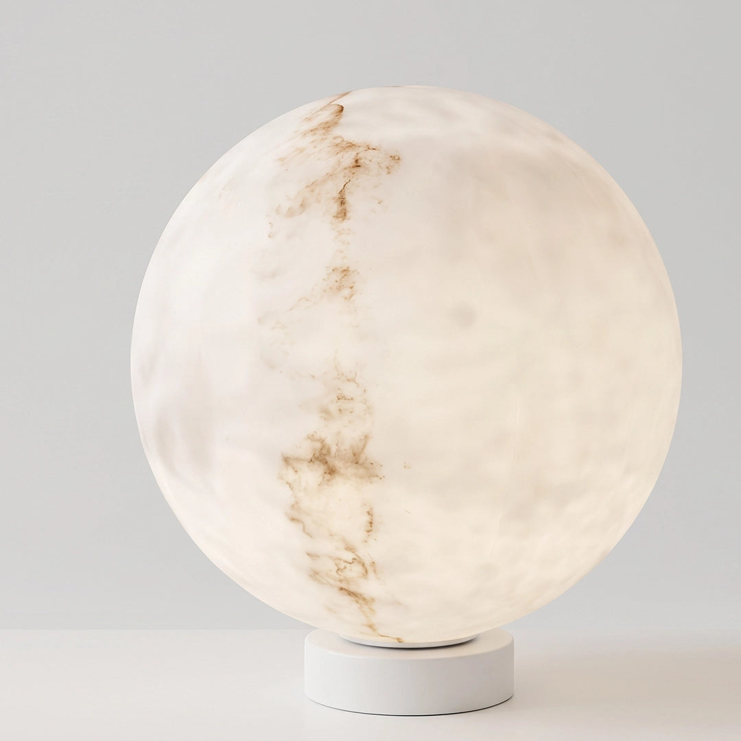 Outdoor pillar lights with a round marble-look globe shade and a white base shown on a white background.