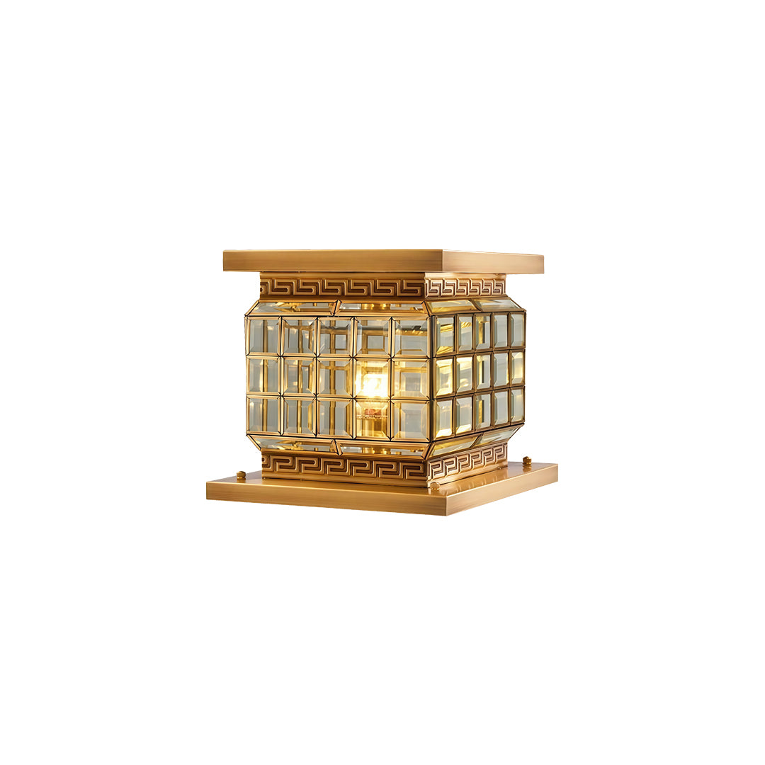 Decorative outdoor pillar lights solar with gold housing and bright ambient glow on white background.