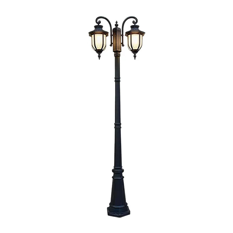 Outdoor post light fixture shown in a clean front product view with dual lanterns and a classic black finish.