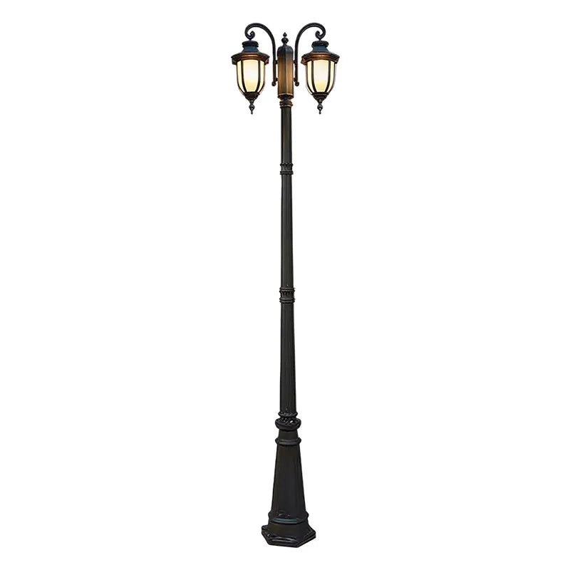 Outdoor post light fixture with a tall black pole and two traditional lantern-style lights.