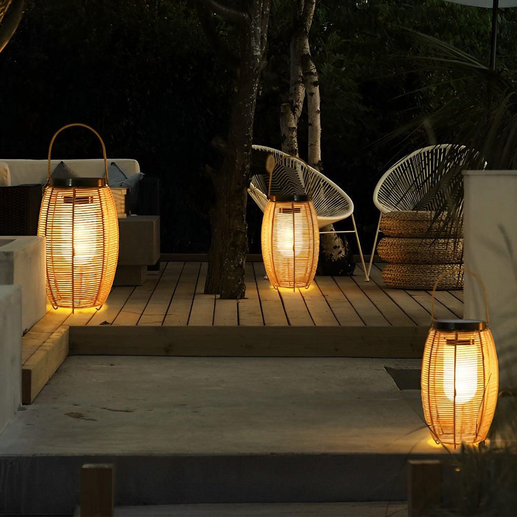Outdoor rattan lanterns illuminating garden area with soft glow.