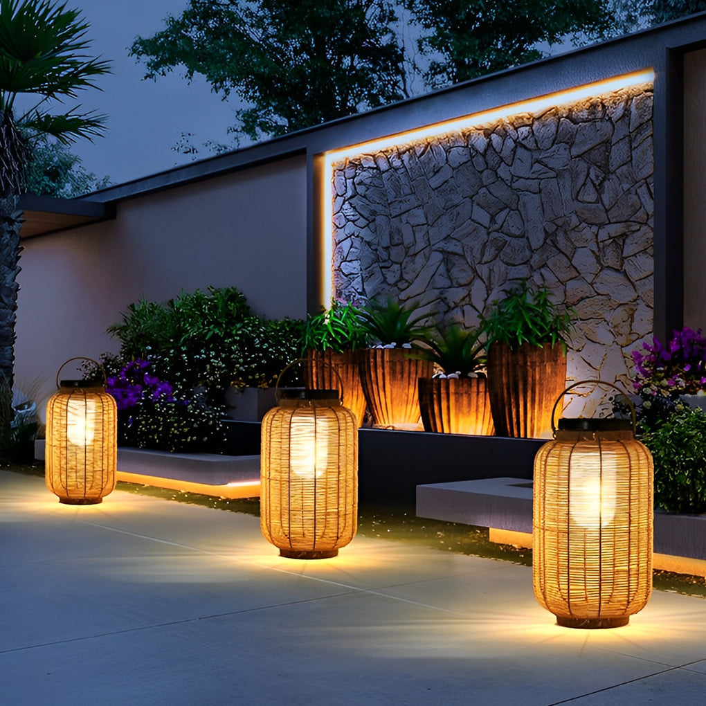 Outdoor rattan lanterns beside modern outdoor seating area.