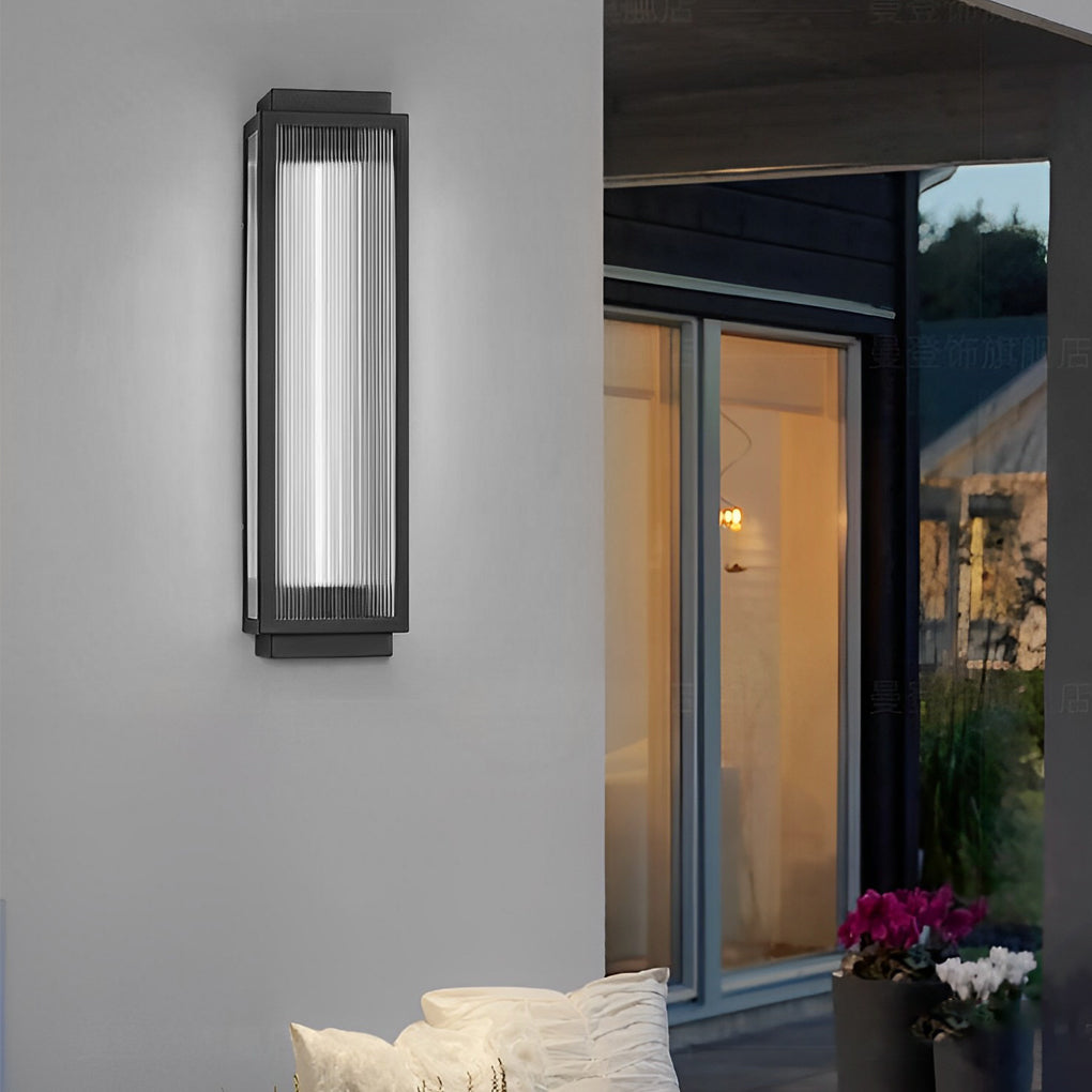 Outdoor reeded glass light with a minimalist black frame, enhancing the curb appeal of a residential home.