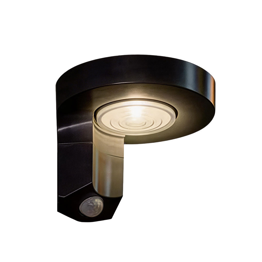 Outdoor solar lighting wall mount with a modern design, highlighting its solar panel.