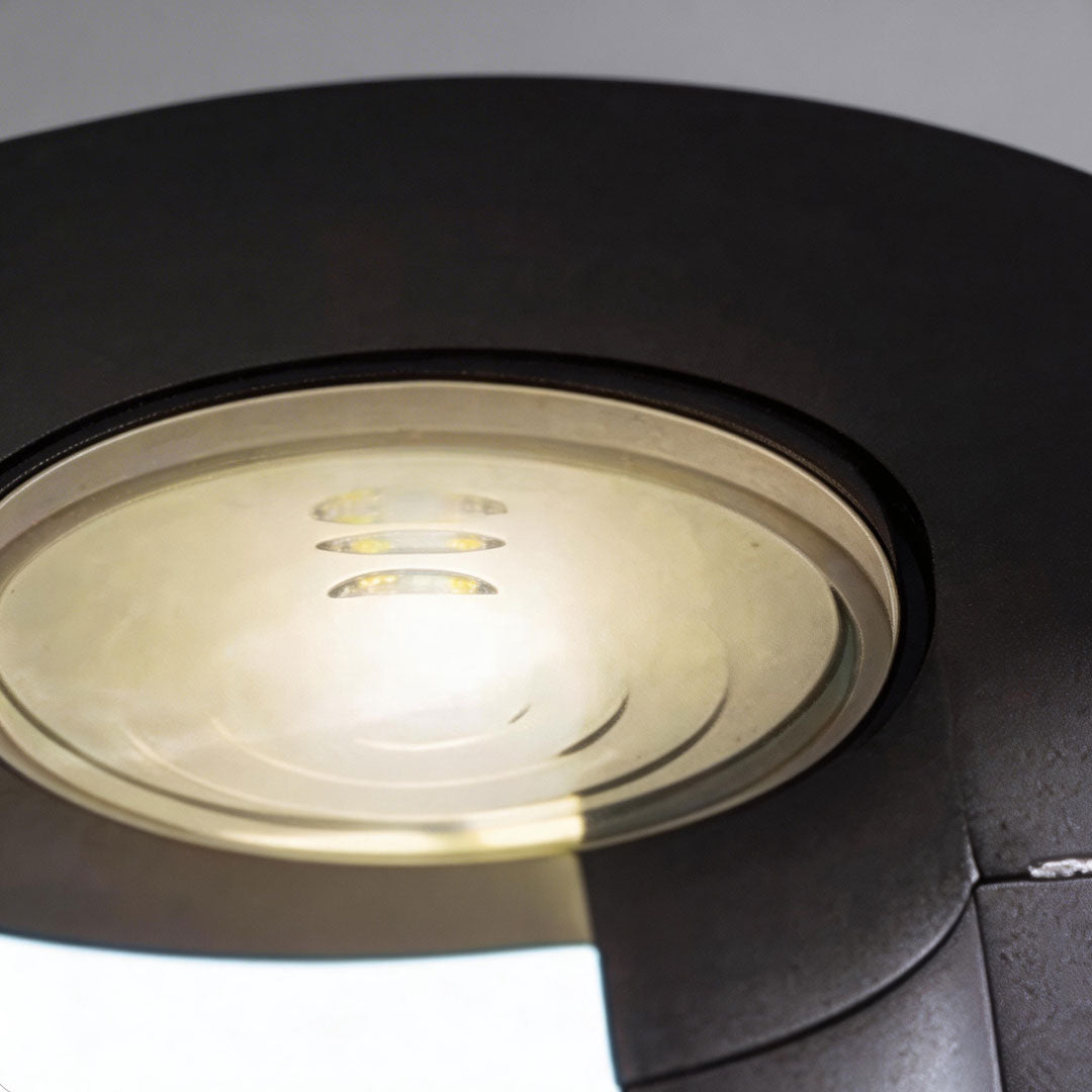 Outdoor solar lighting wall mount with a sleek design, providing ambient lighting.