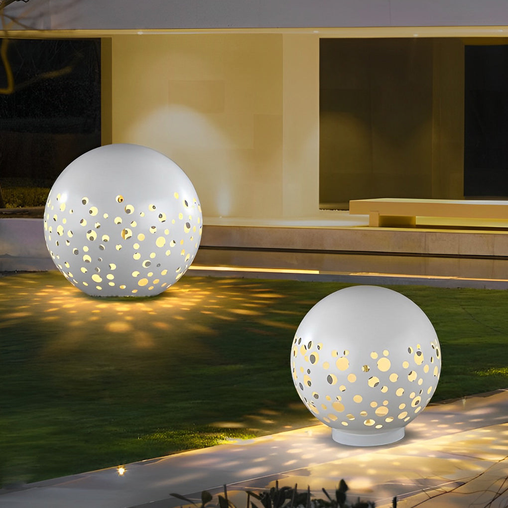 Outdoor sphere light with a close-up of its perforated pattern and modern design.