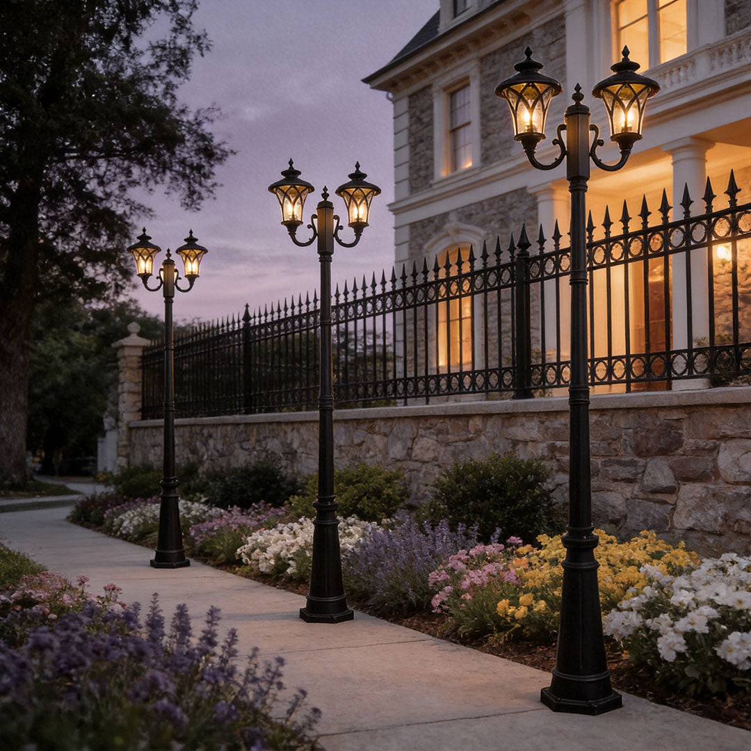Outdoor street light with a classic design, lighting up a landscaped garden pathway.