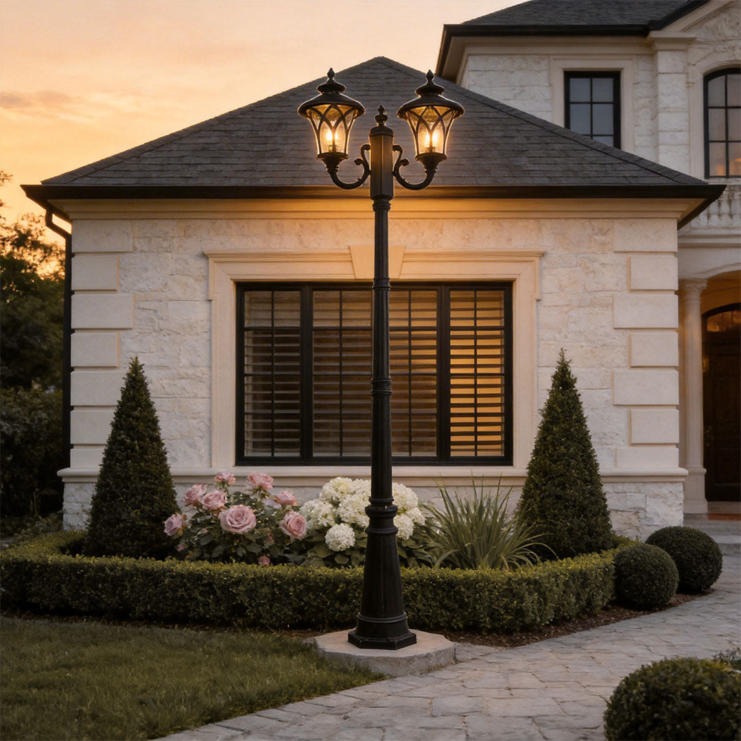 Outdoor street light with a vintage design, enhancing a luxury house driveway.