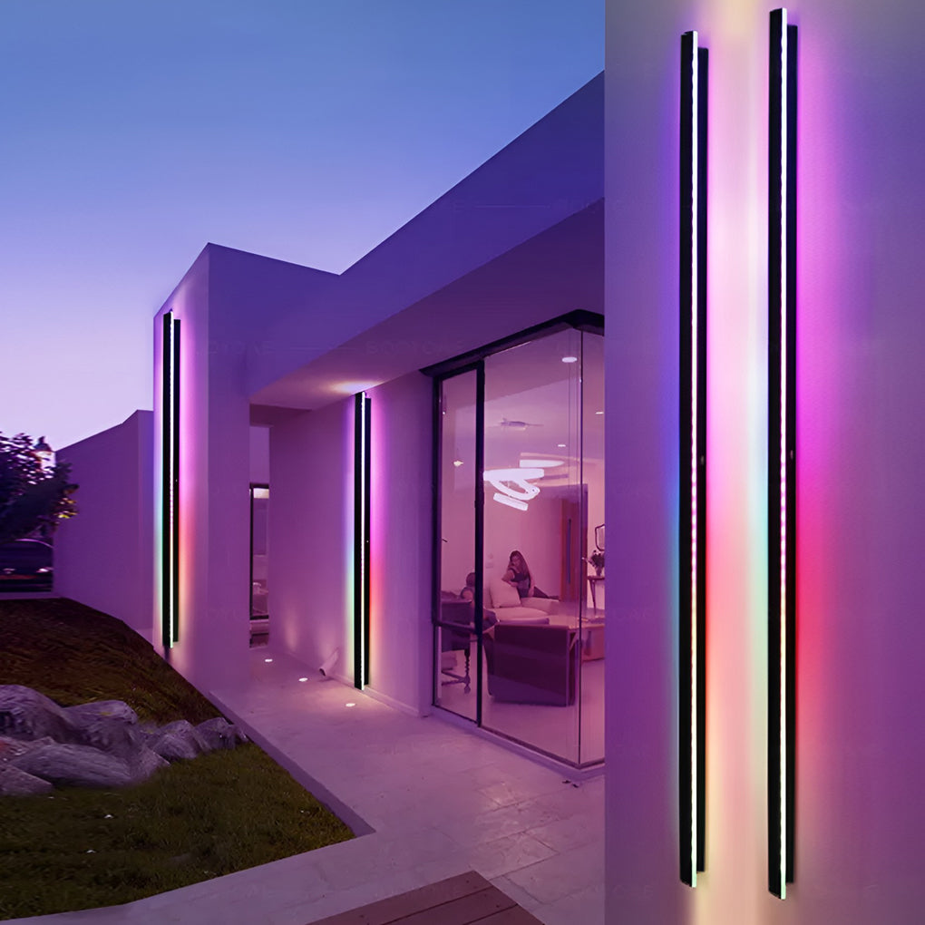 Outdoor strip wall light providing ambient light beside a sliding glass door.