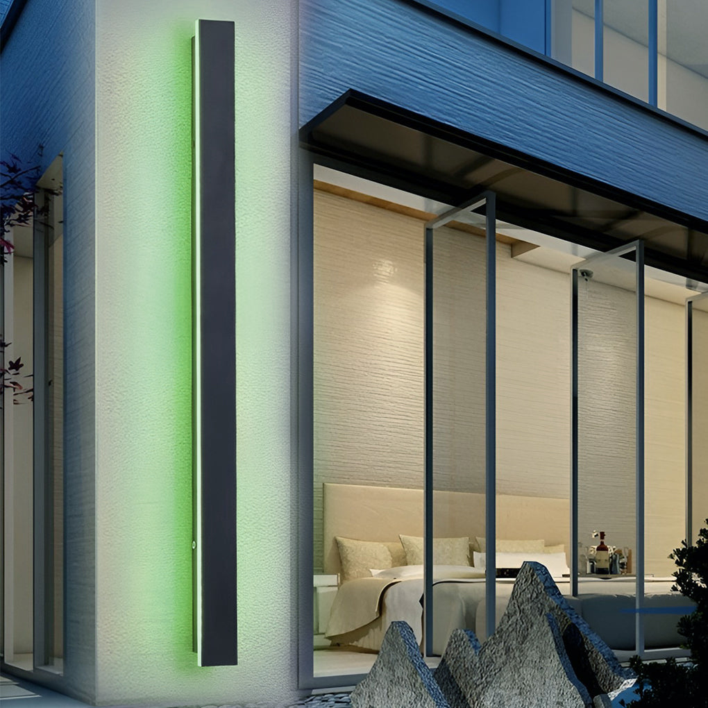 Outdoor strip wall light casting vibrant colors on a modern facade.