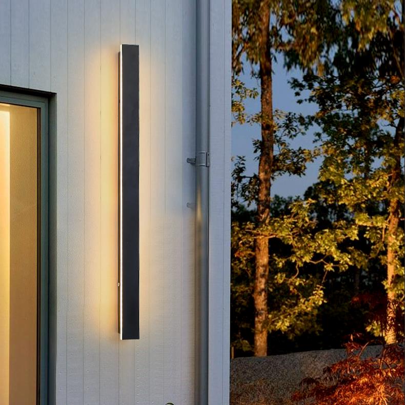 Outdoor strip wall light black linear LED integrated light provides bright, energy efficient lighting for exterior walls.