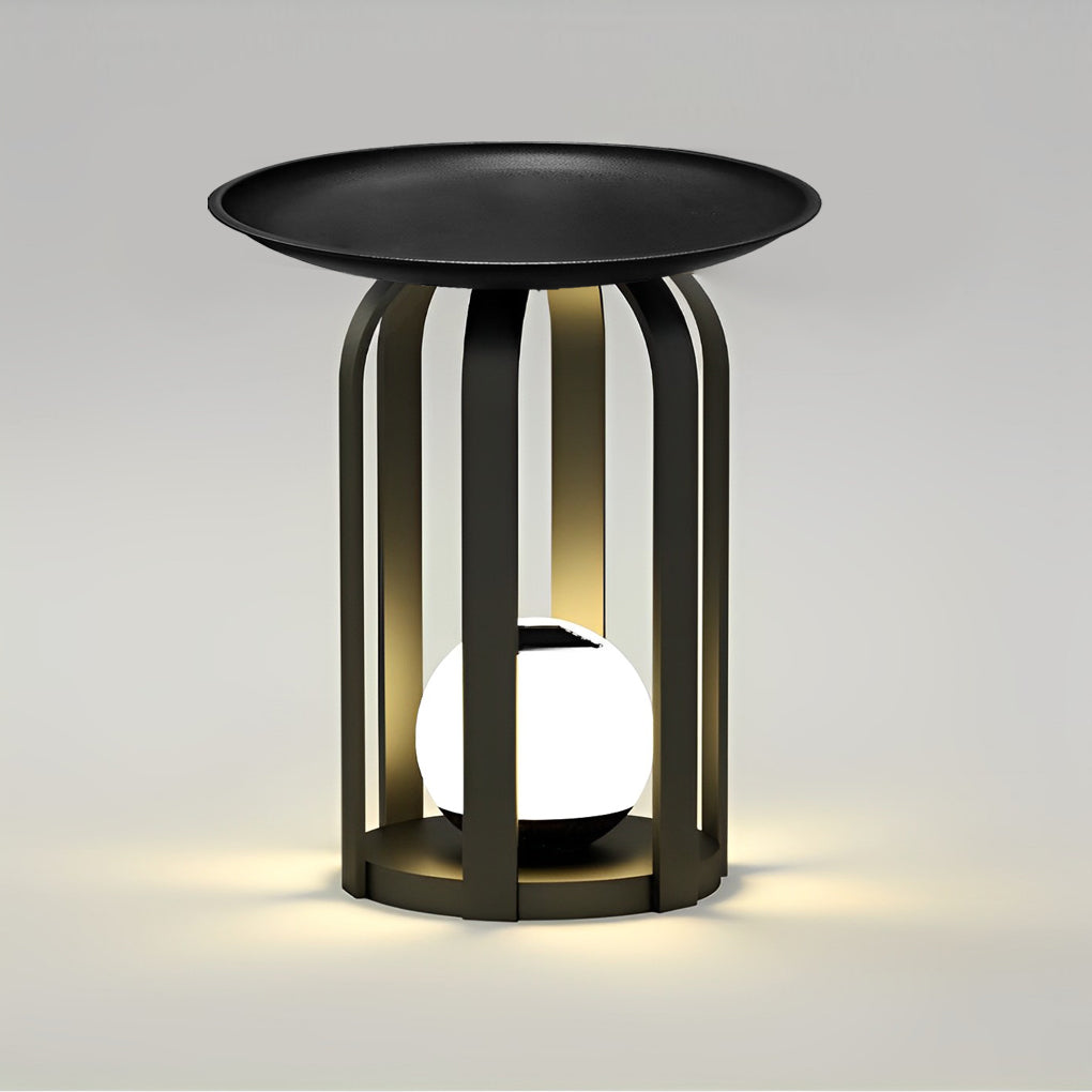 Outdoor tray floor lamp with a black finish, providing elegant lighting near a sofa.
