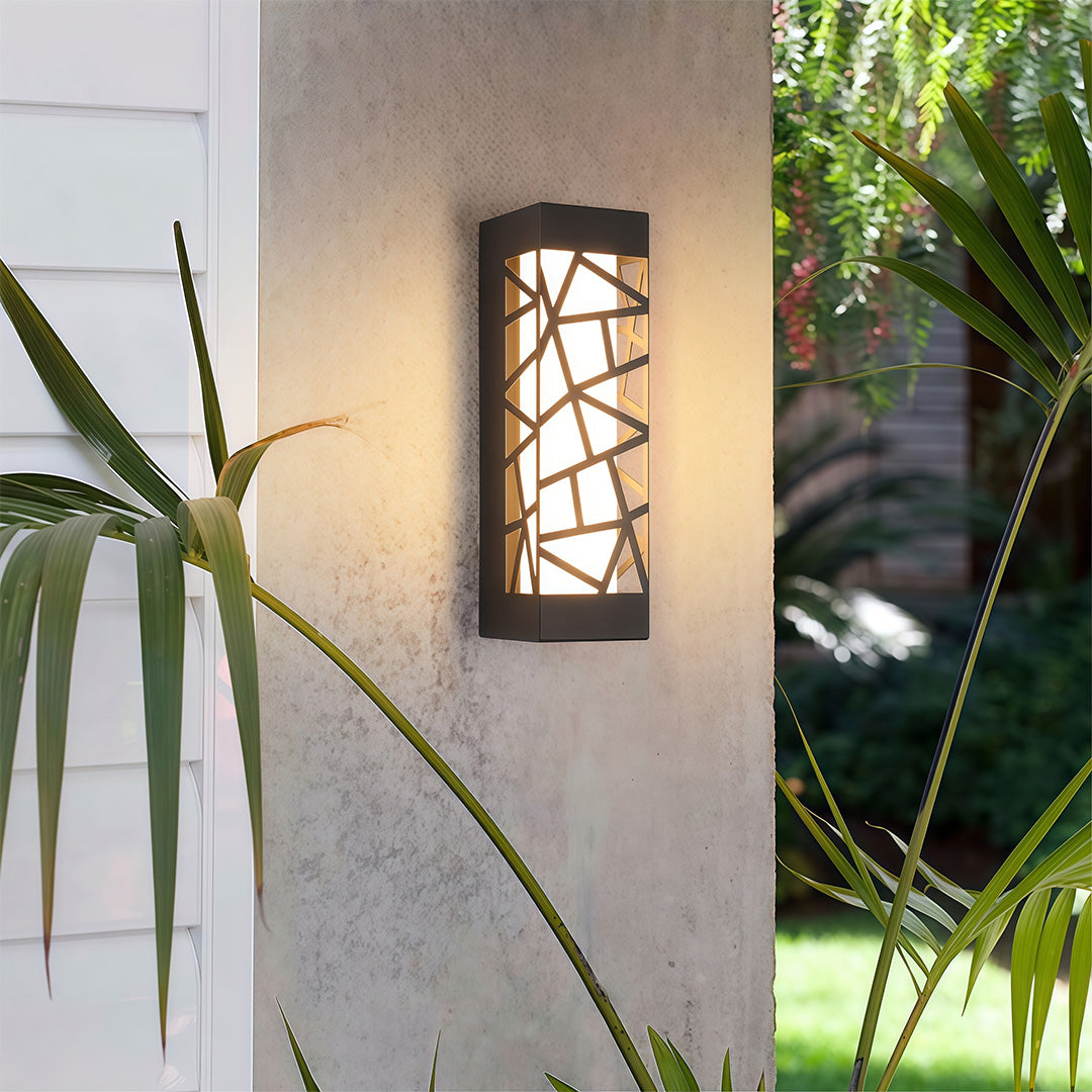 Modern luxury chandeliers inspired outdoor wall mount lights beside greenery in evening setting