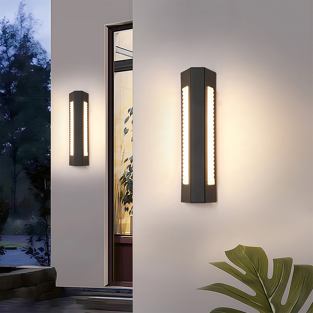 Modern luxury chandeliers inspired outdoor wall mount lights beside greenery in evening setting