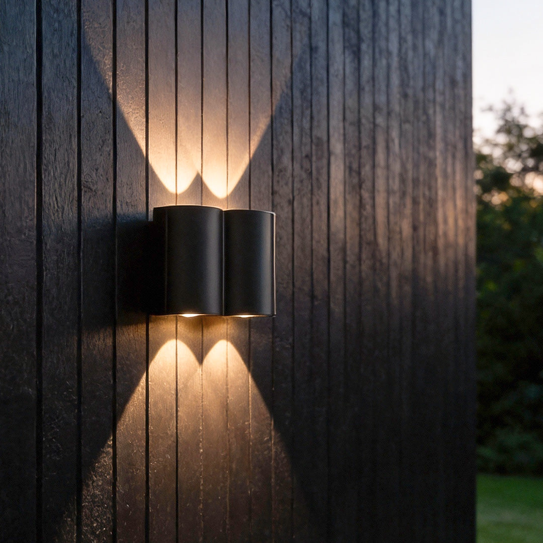 Outdoor wall light up down enhancing a contemporary facade with sleek, ambient lighting.