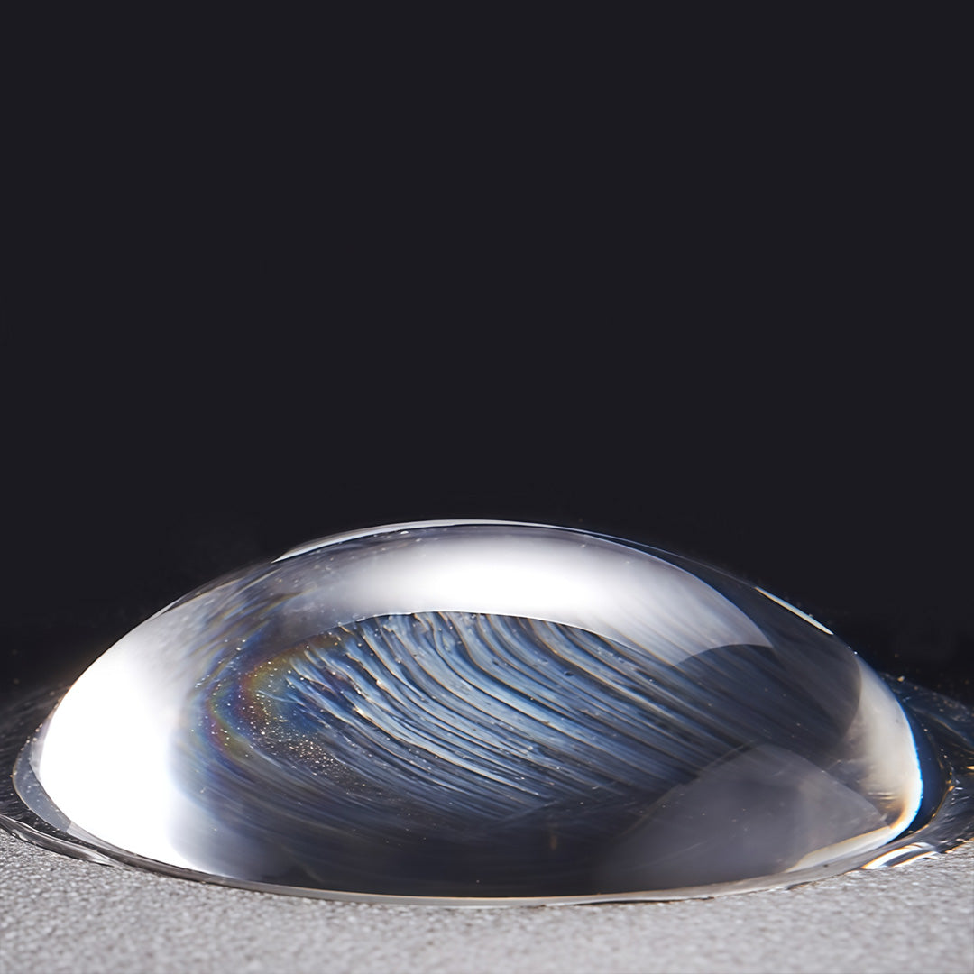 Outdoor wall light up down in triple-light design, close-up of the light fixture.