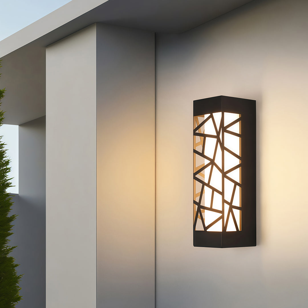 Outdoor wall mount lights creating warm glow on modern white exterior wall