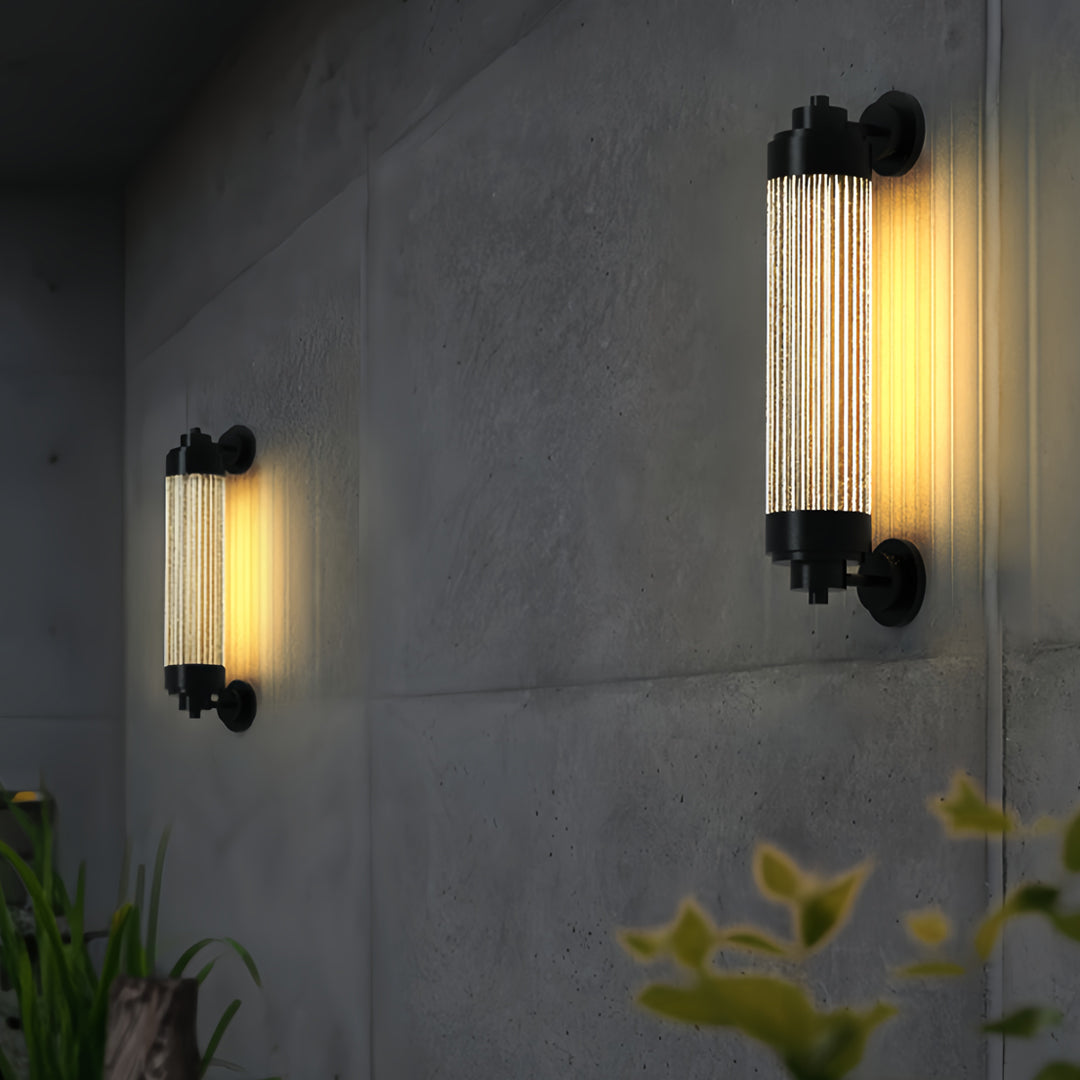 Slim warm-glow outdoor wall lighting LED fixtures installed along a modern exterior walkway.