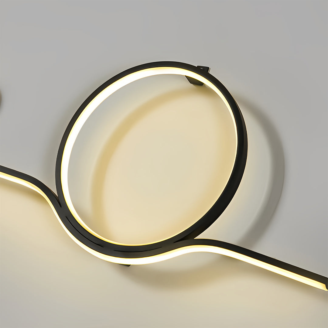 Close-up of circular LED detail on contemporary outdoor wall lights.