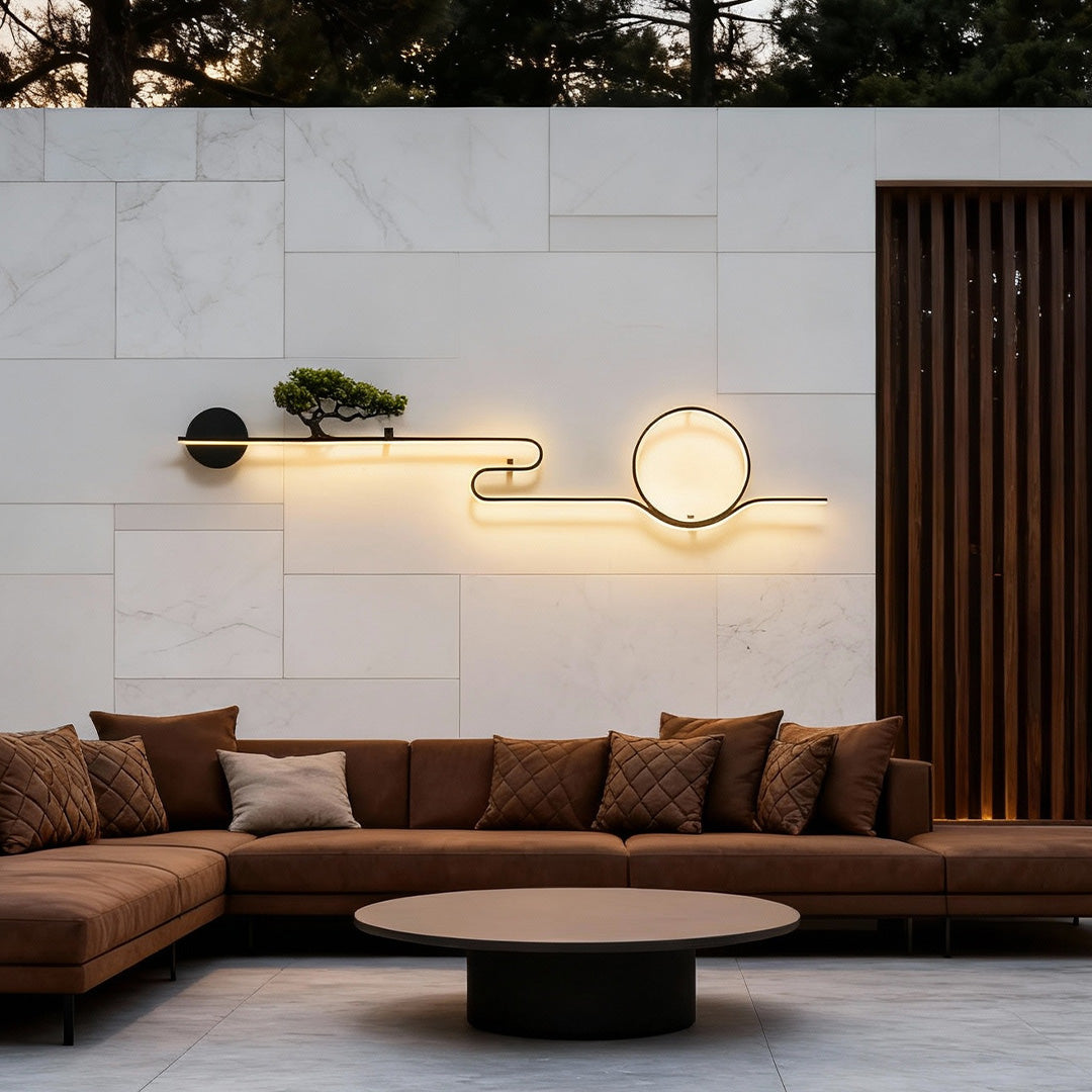 Outdoor wall lights enhancing a modern seating area with warm ambient illumination.