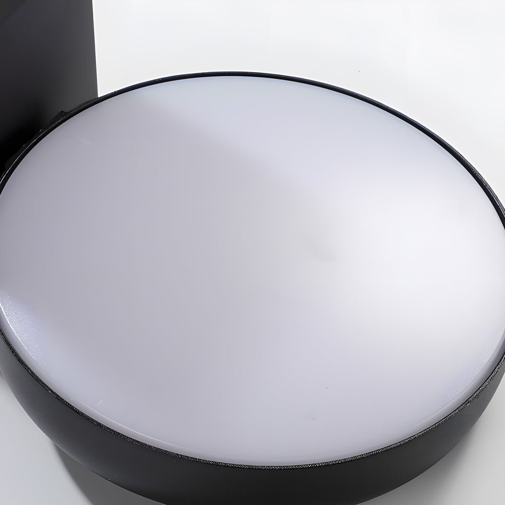 Outdoor wall lights with motion sensor, showcasing its circular light panel.