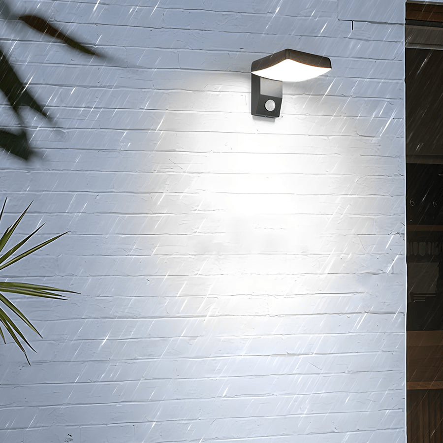 Outdoor wall lights with motion sensor, close-up view of its modern black design.