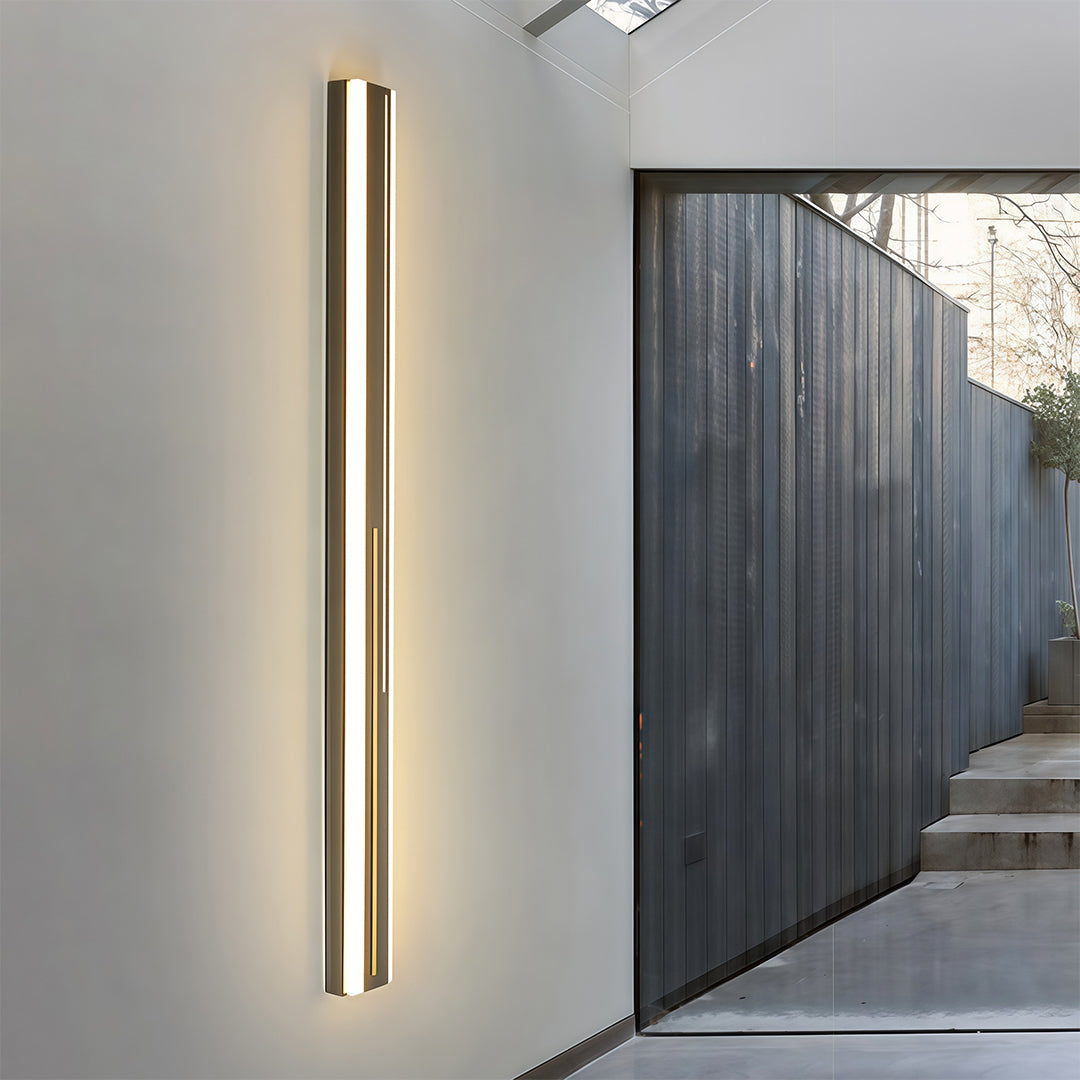 Outdoor wall mount lighting installation on modern architectural facade with warm illumination effect