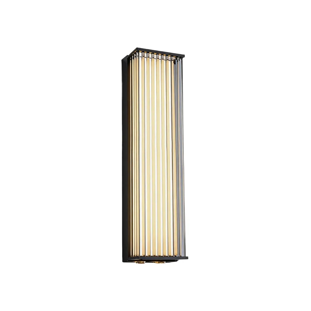 Outdoor wall sconce with vertical ribbed glass black frame and warm glow