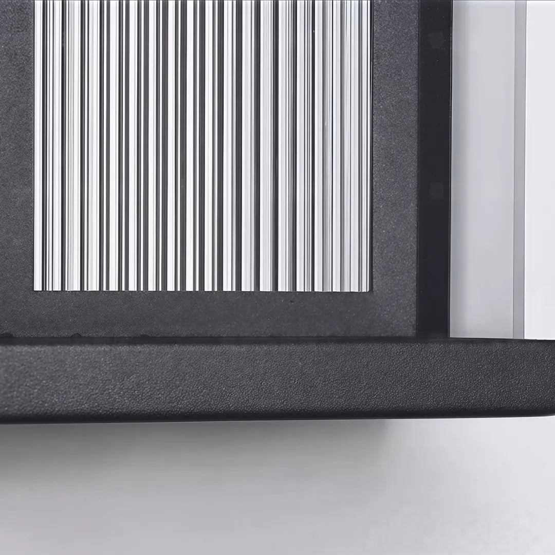 Outdoor wall sconce with vertical ribbed glass and black metal frame detail