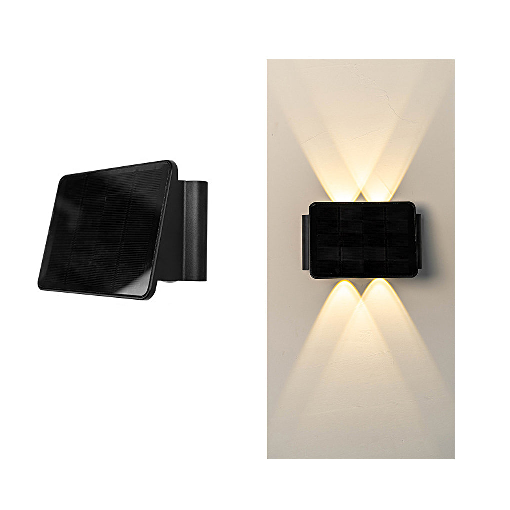 Outdoor wall sconce up and down lighting with a textured surface, showcasing modern design.