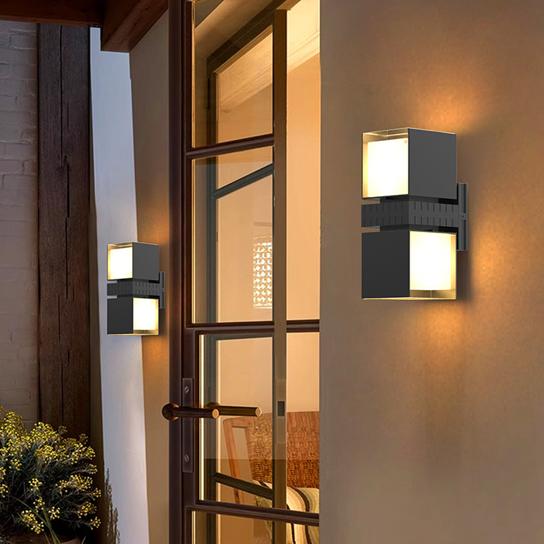 Exterior wall scene featuring modern outdoor wall up lighting illuminating an entryway with warm ambient glow.