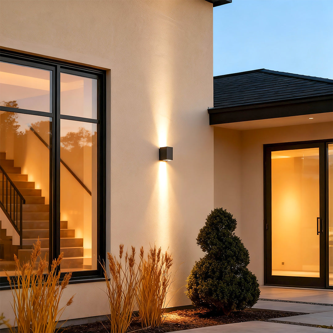 Outdoor wall wash lights under rainfall showing waterproof performance.