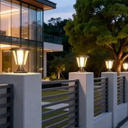 Outdoor waterproof post lamp illuminating a modern garden pathway with warm, directional glow.