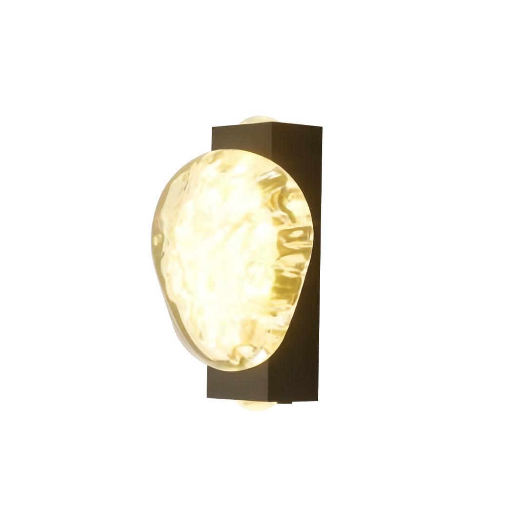 Single oval-shaped gold up and down outdoor wall lights with decorative textured finish shown against white background.