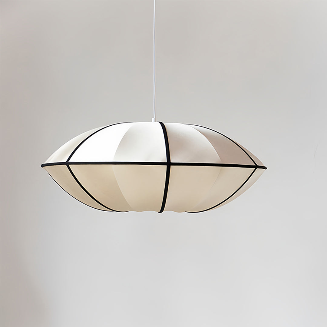 Oval fabric shade pendant light with horizontal framework creating stylish dining room lighting