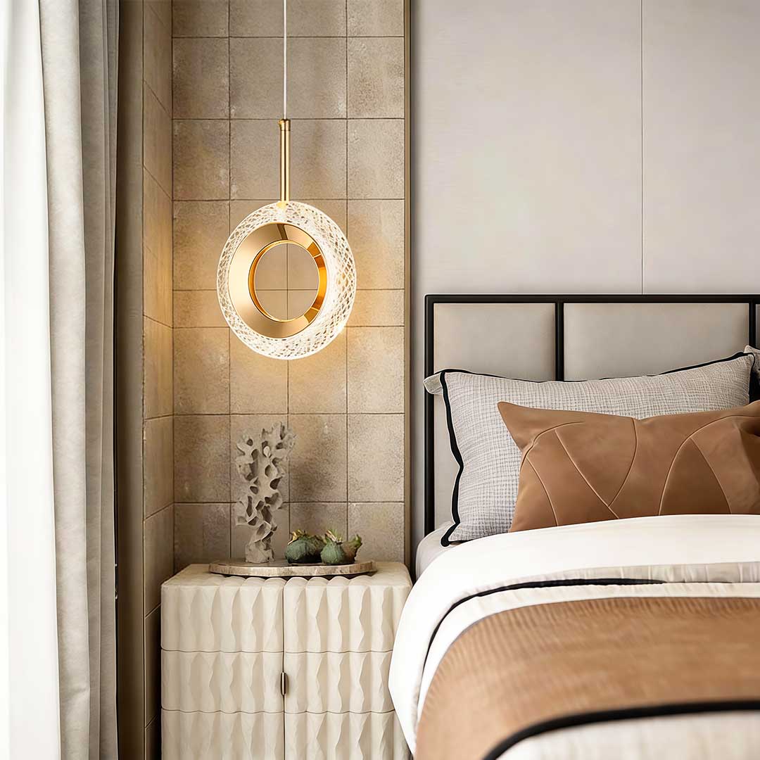 Oval-shaped unique pendant light suspended next to a modern bed.