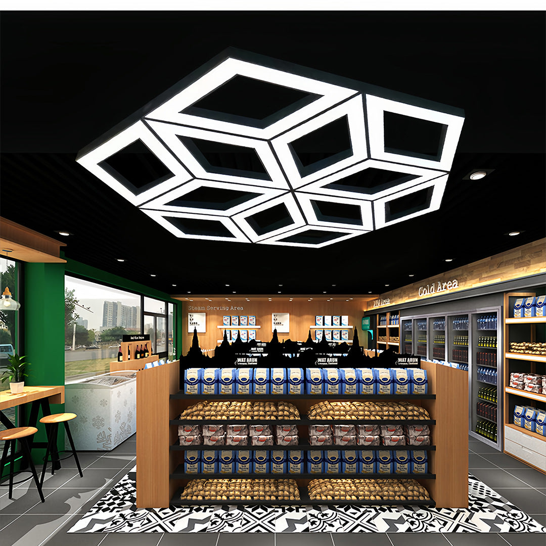 Modern black chandelier with overlapping geometric elements, adding sophistication and boldness to contemporary interiors.