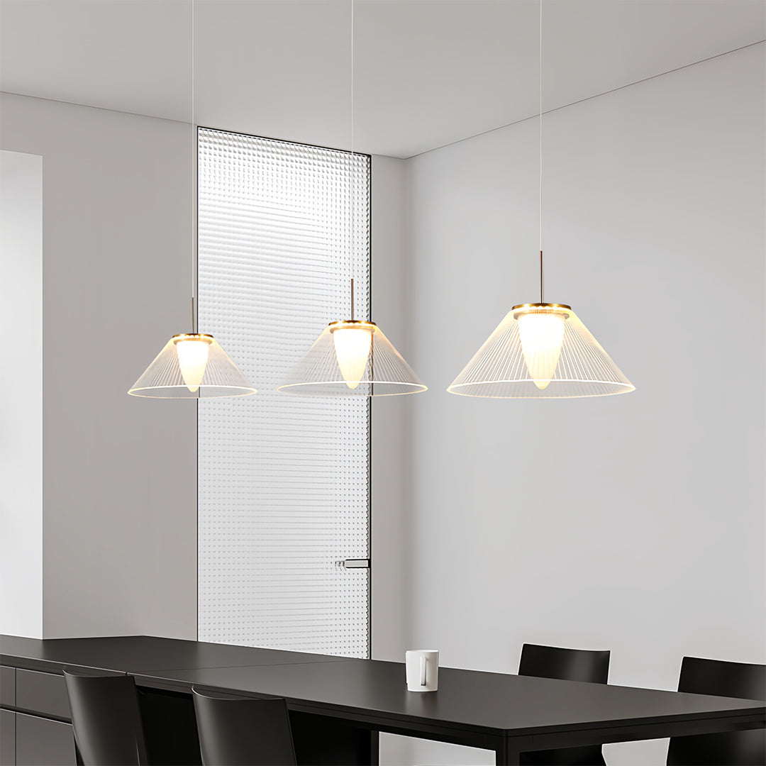 Pair of modern white mesh pendant lights hanging above a dining table in a contemporary setting