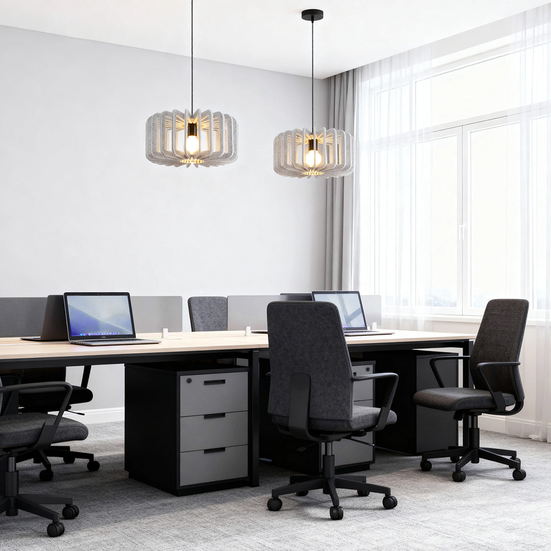 Pair of natural wood slat Nordic pendant lights over a bright office meeting desk 