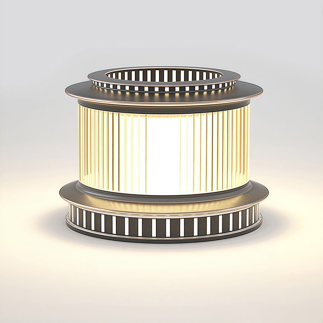 A pair of stainless steel pillar lights enhancing the entryway of a modern home, creating a stylish and safe environment.