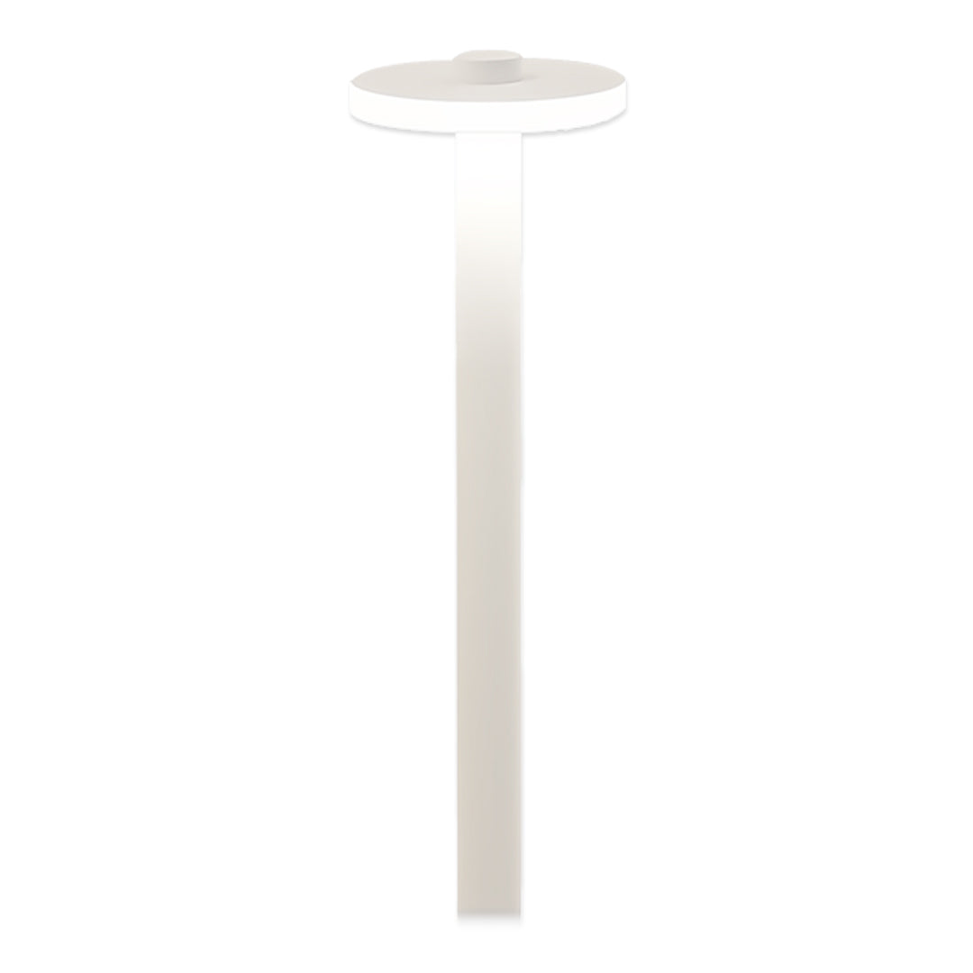 Slim white path lighting outdoor fixture with a modern circular shade and tall narrow profile.