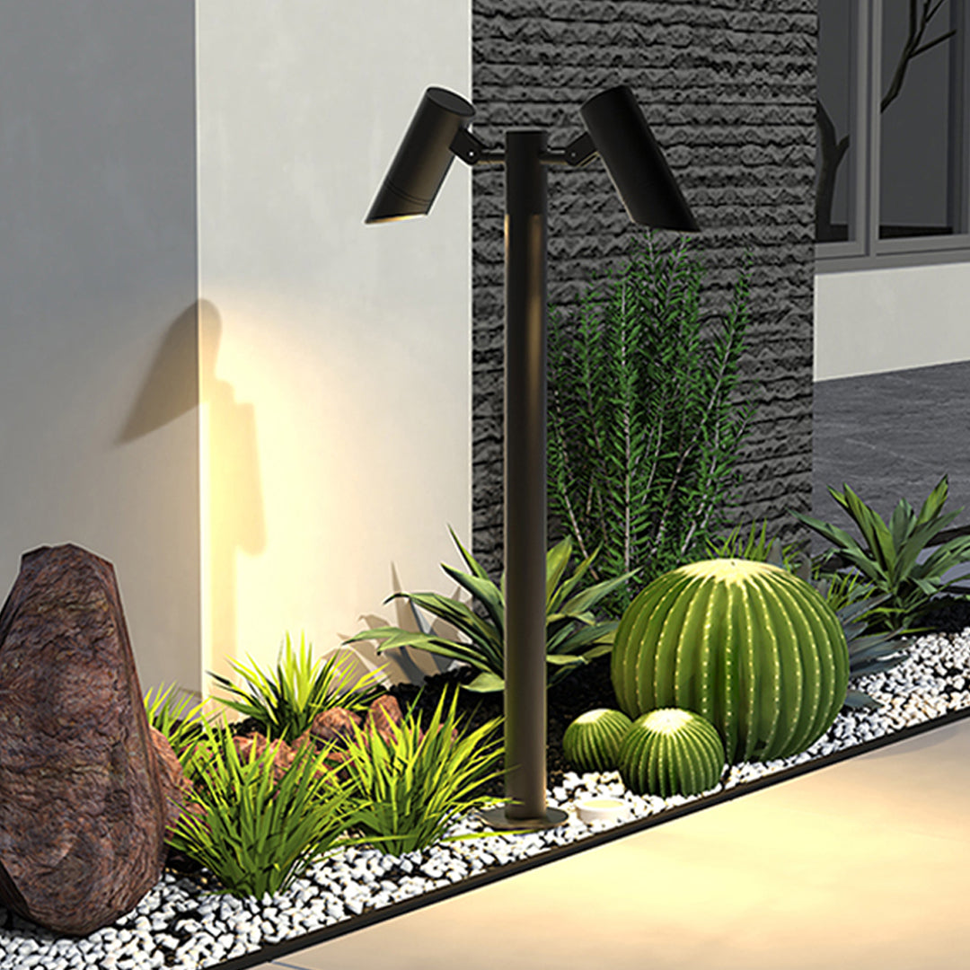 Residential pathway lighting with stylish path lights led casting warm glow on textured wall.