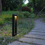 Pathway bollard light along a garden pathway, offering stylish and functional lighting.